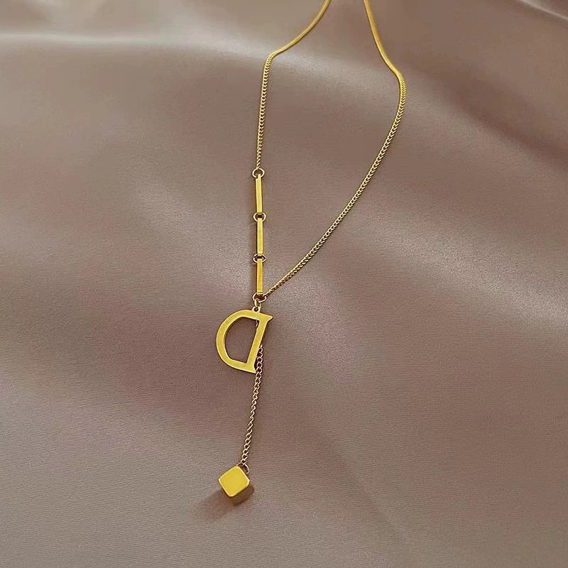 Gold Plated Stainless Steel D Pendant Lariat Necklace / KN2002