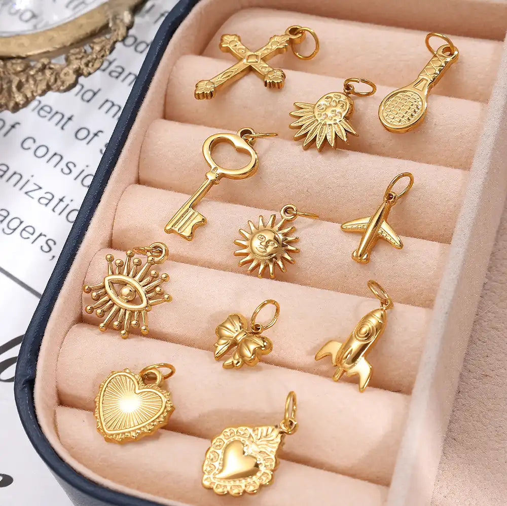 Stainless steel 18K gold plated bow heart pendant / 25504024