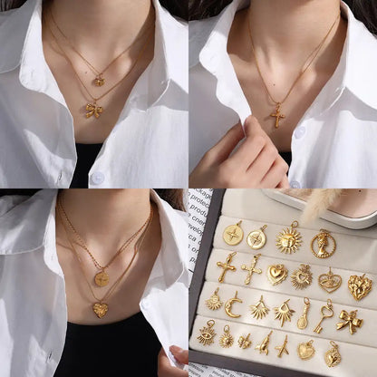 Stainless steel 18K gold plated bow heart pendant / 25504024
