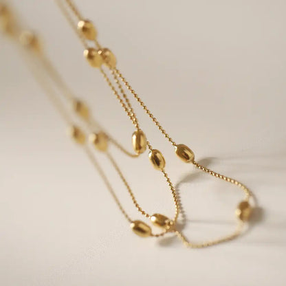 Titanium steel Golden oval rice beaded three - layer stacked necklace / 25004006