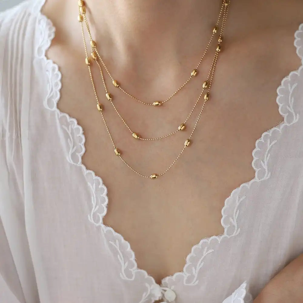 Titanium steel Golden oval rice beaded three - layer stacked necklace / 25004006