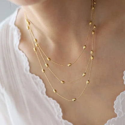 Titanium steel Golden oval rice beaded three - layer stacked necklace / 25004006